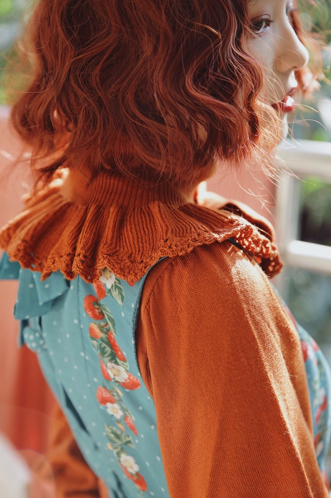 Off-white wool lolita sweater three-quarter view cream color ruffled details neutral lolita layering