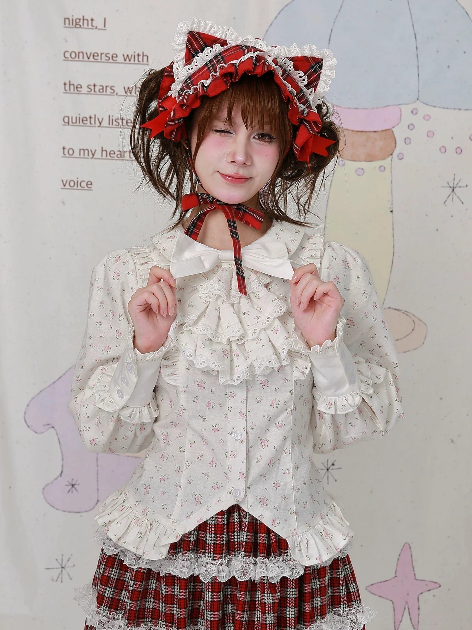 Detailed view of Old School Lolita floral blouse showing puffed long sleeves, layered ruffled front placket, off-white fabric with subtle floral patterns, and authentic jabot construction