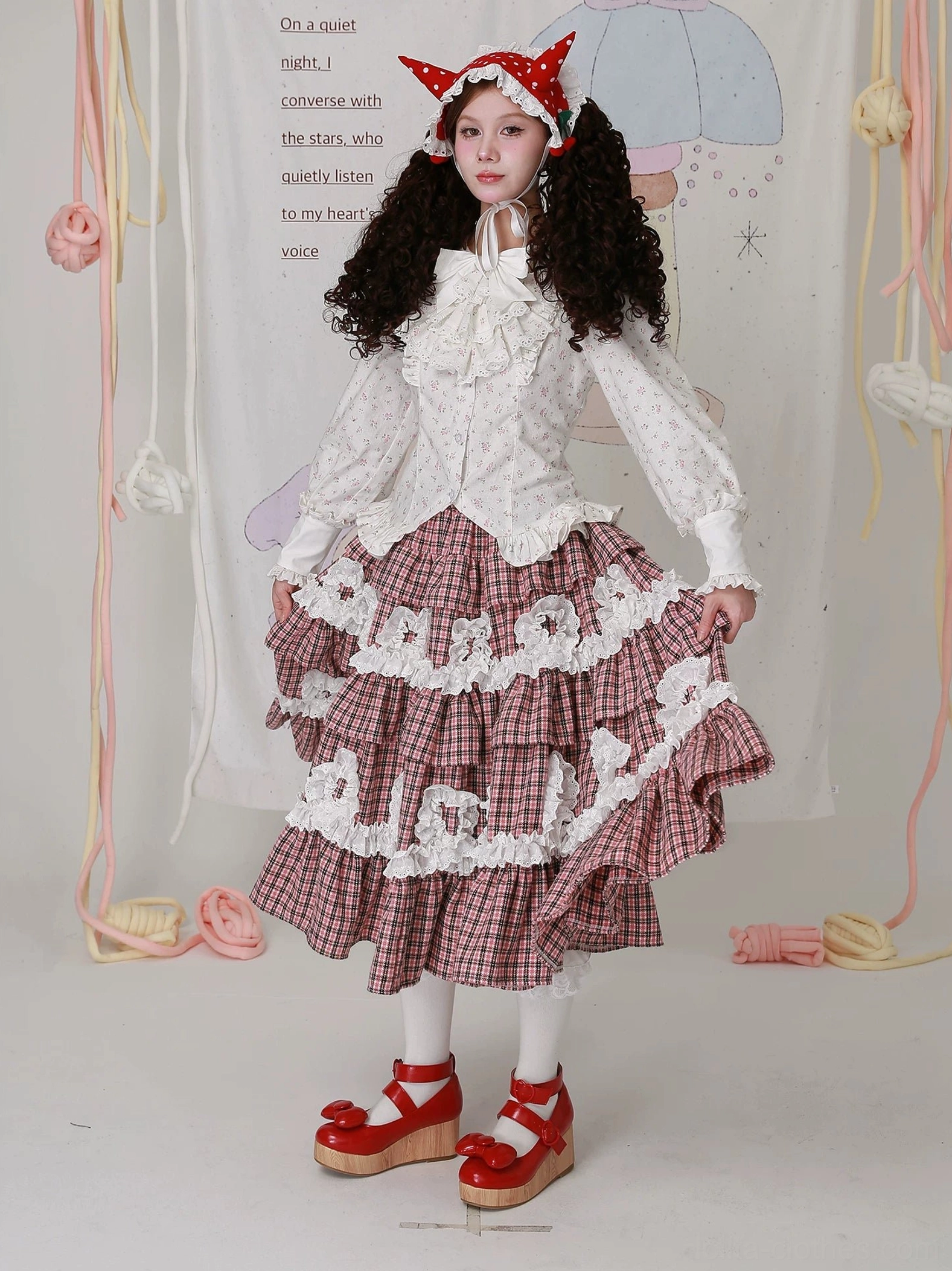 Vintage Old School Lolita floral print blouse highlighting puffed sleeves with ruffled cuffs, fitted waist with adjustable lace-up back, and authentic jabot front decoration