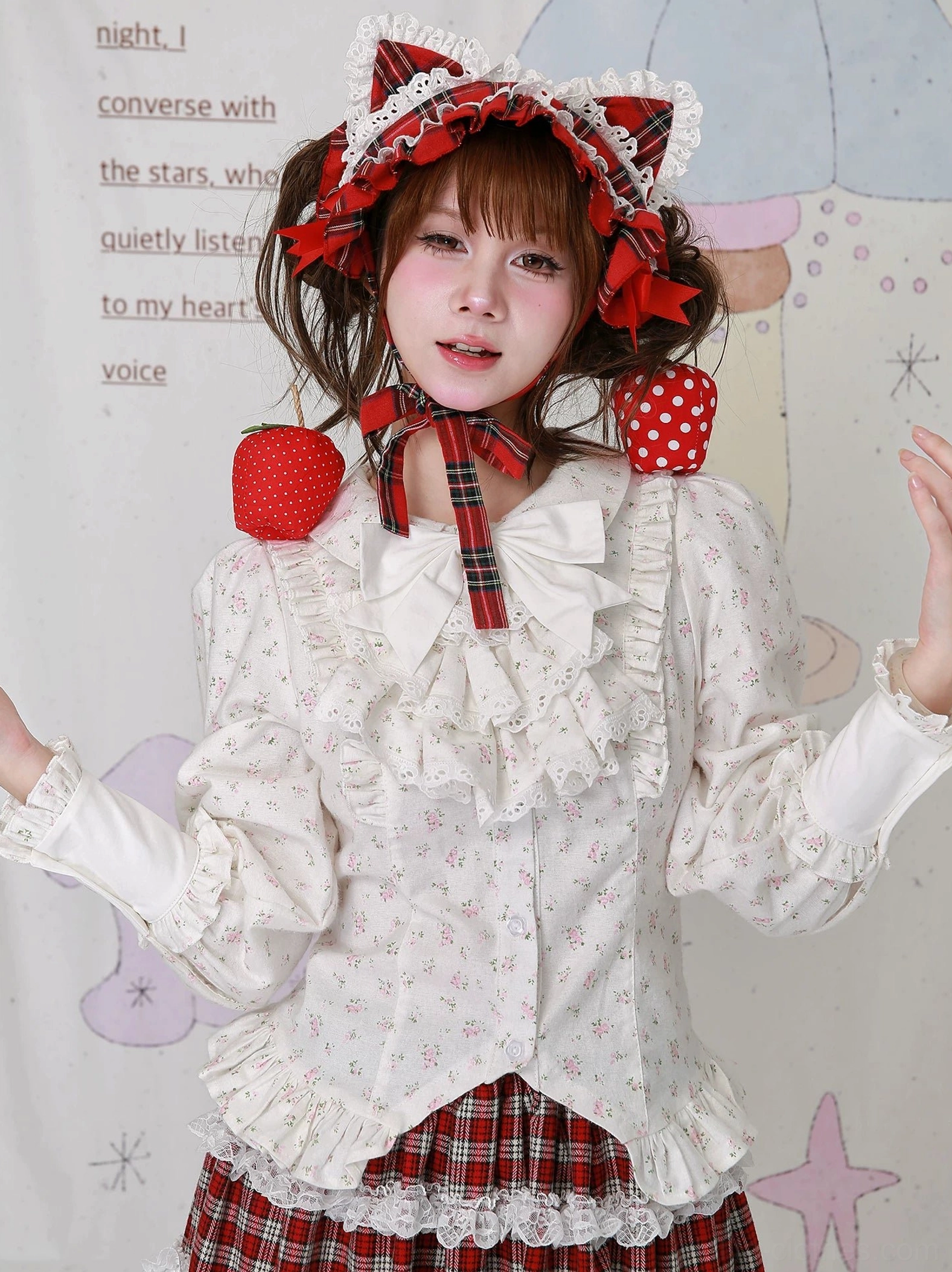 Three-quarter front view of Old School Lolita floral blouse showing off-white fabric with tiny scattered floral prints, layered ruffled front placket, and large white collar bow detail