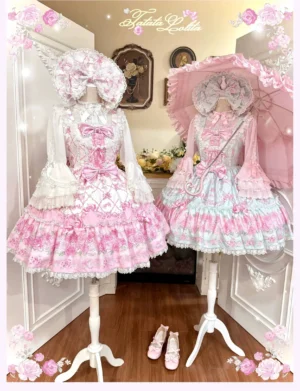 Two matching old school lolita sweet jsk dresses with bishop sleeves paired with pink parasols and bonnets, showcasing color-block pastel blue and pink floral print design with ruffled lace-trimmed layered skirt construction