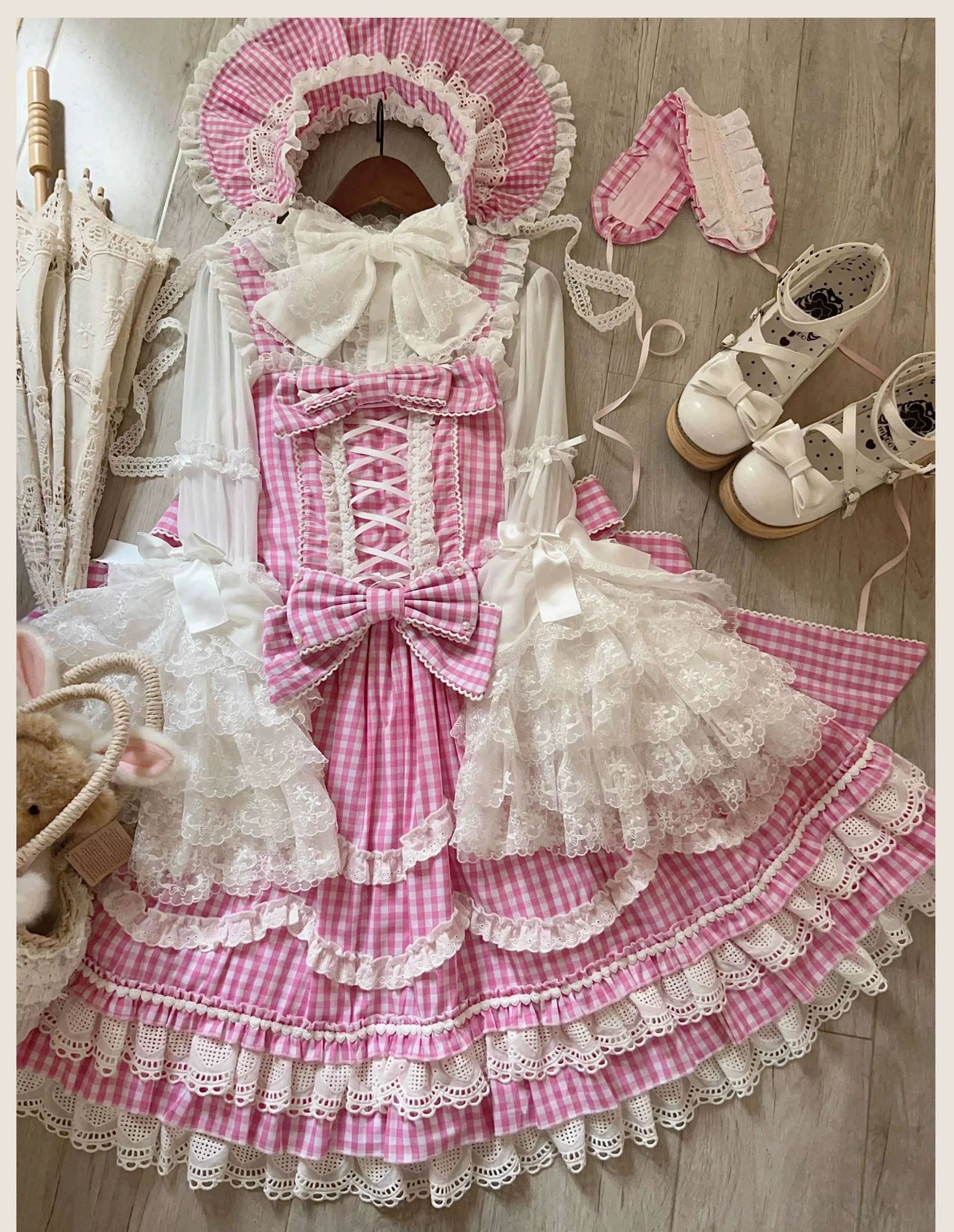 Pink gingham old school Lolita jumper skirt dress, styling suggestions showing how to coordinate with petticoat, shoes, socks, and accessories for complete lolita look
