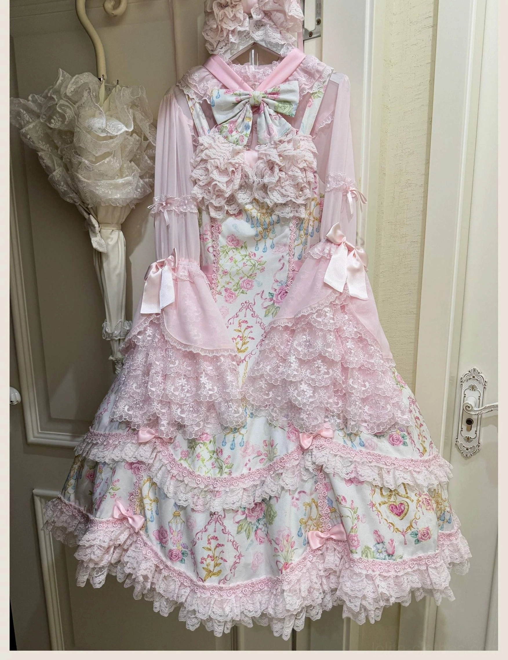 Pink floral old school Lolita JSK dress showing side zipper closure and fitted waist construction detail