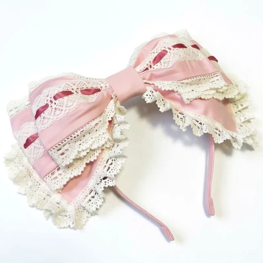 Berry pink Old School Lolita bow KC headband with layered pink satin bows, white lace trim, and red ribbon accents