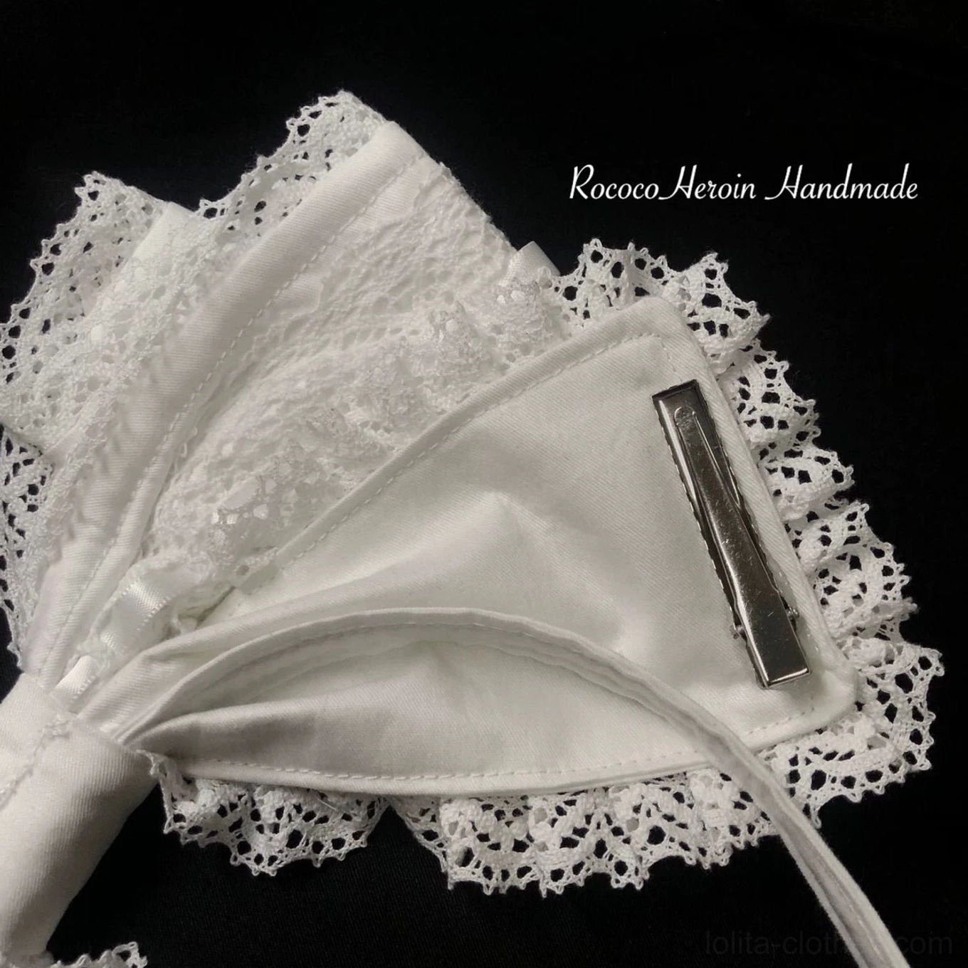 Close-up of Old School Lolita lace bow KC fixed metal clip attachment for secure headband styling