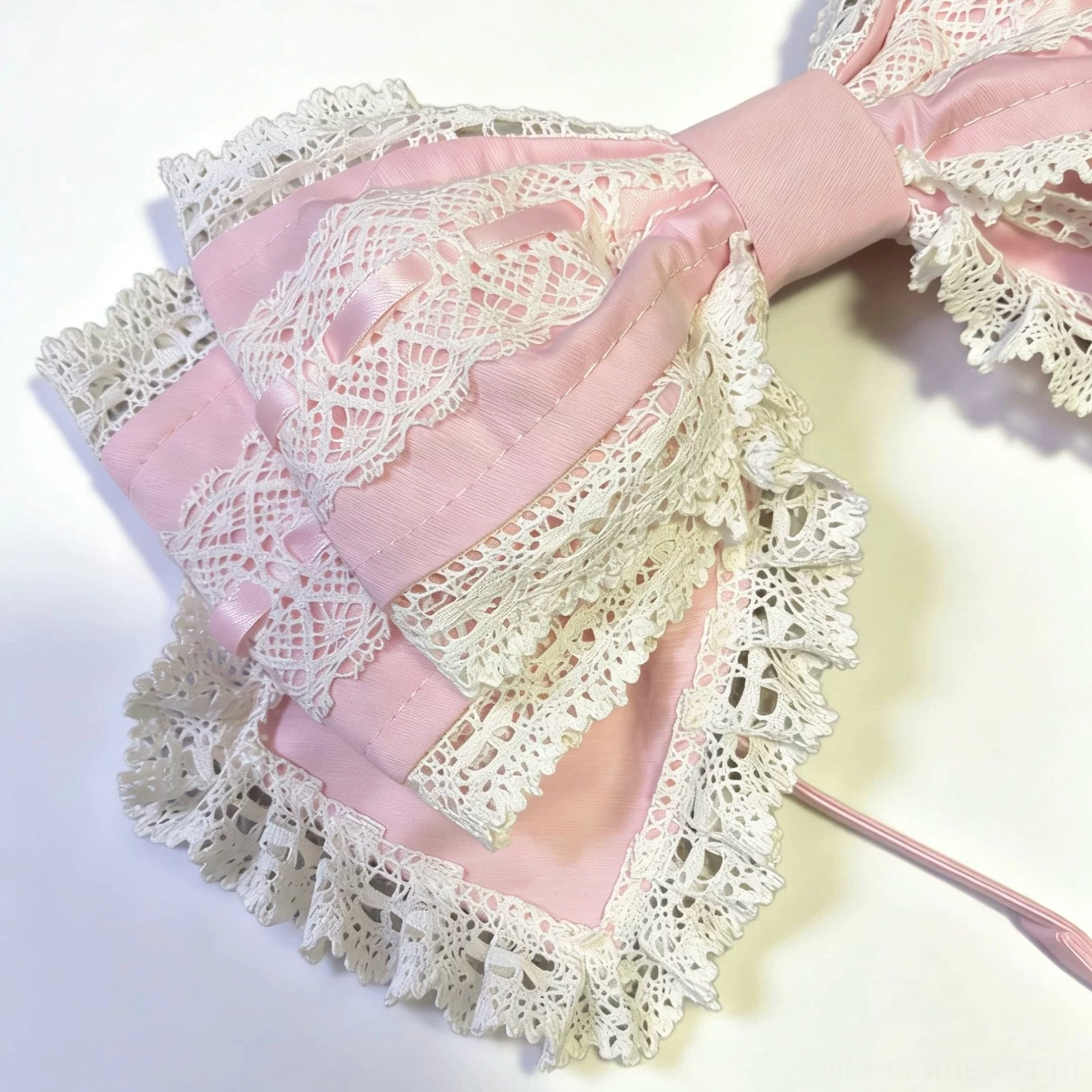 Pink and white tiered Lolita bow KC headband with stacked pink satin layers and ruffled white lace trim