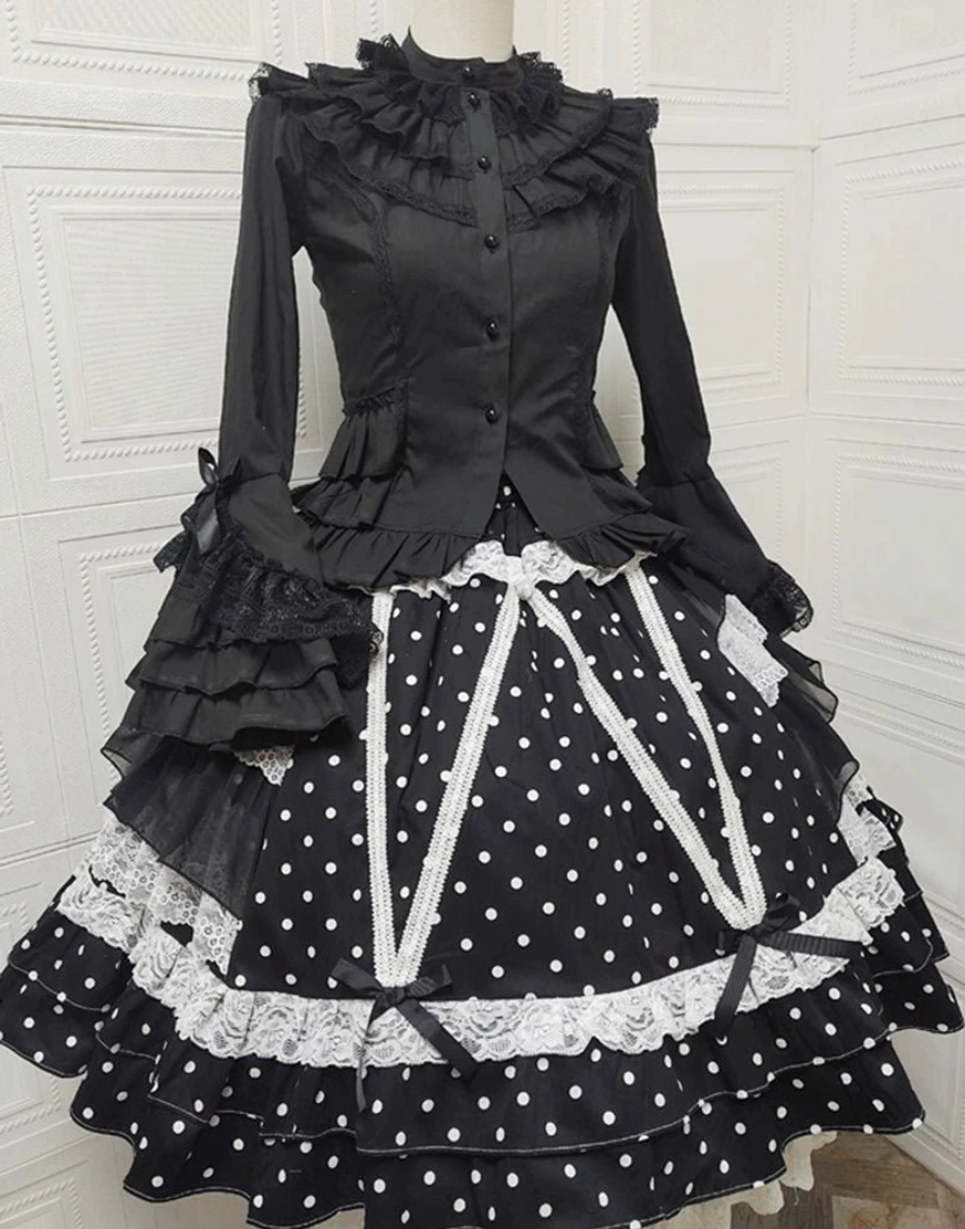 Black Old School Lolita skirt with white polka dots and tiered lace accents front view on dress mannequin