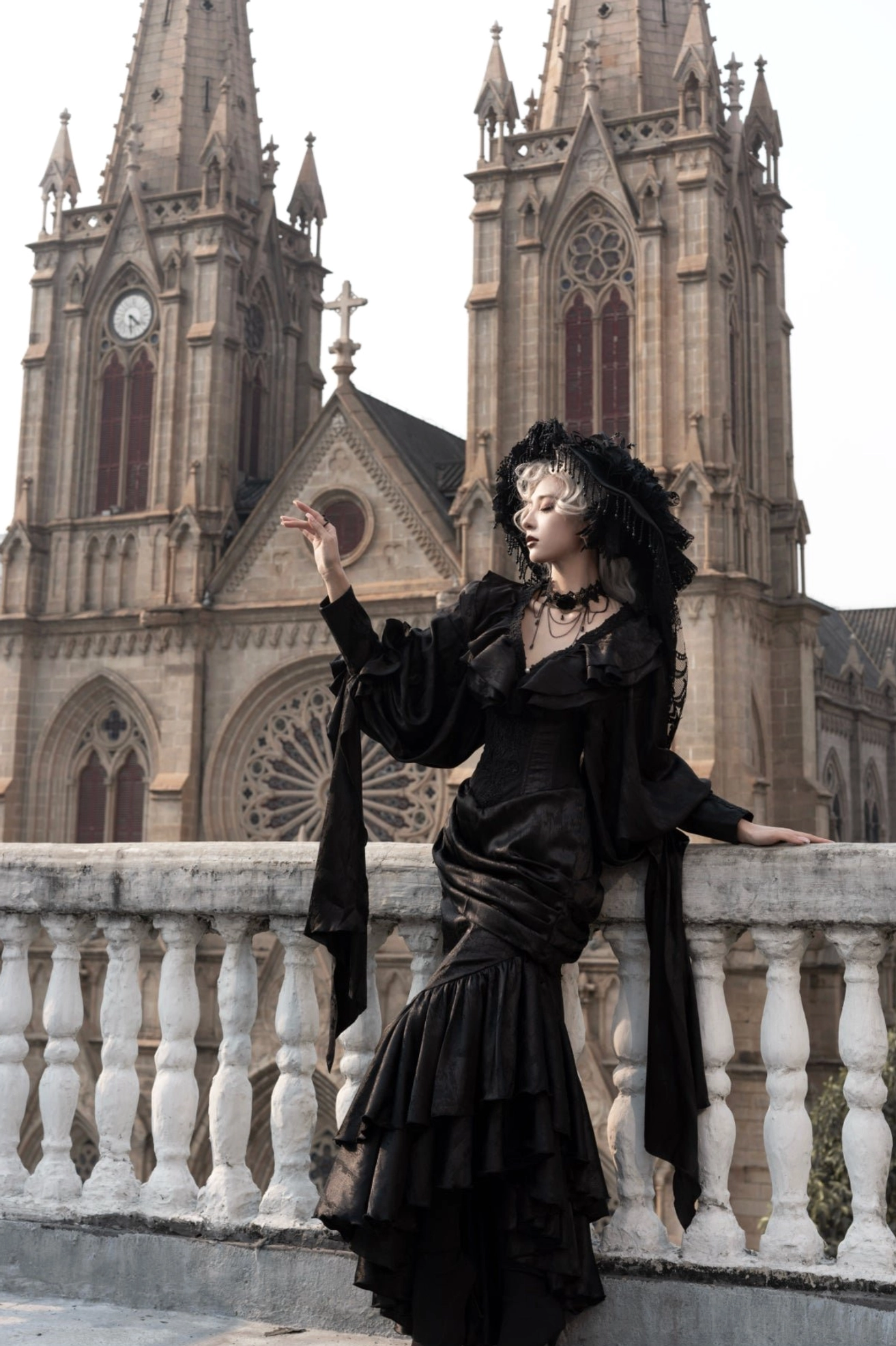 Oracle black mermaid gothic lolita skirt side leaning pose showing fitted corset waist and delicate sweetheart neckline