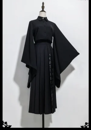 Oriental Ouji fashion two-piece set featuring black pleated skirt with calligraphy print and wide-sleeve matching blouse on dress form