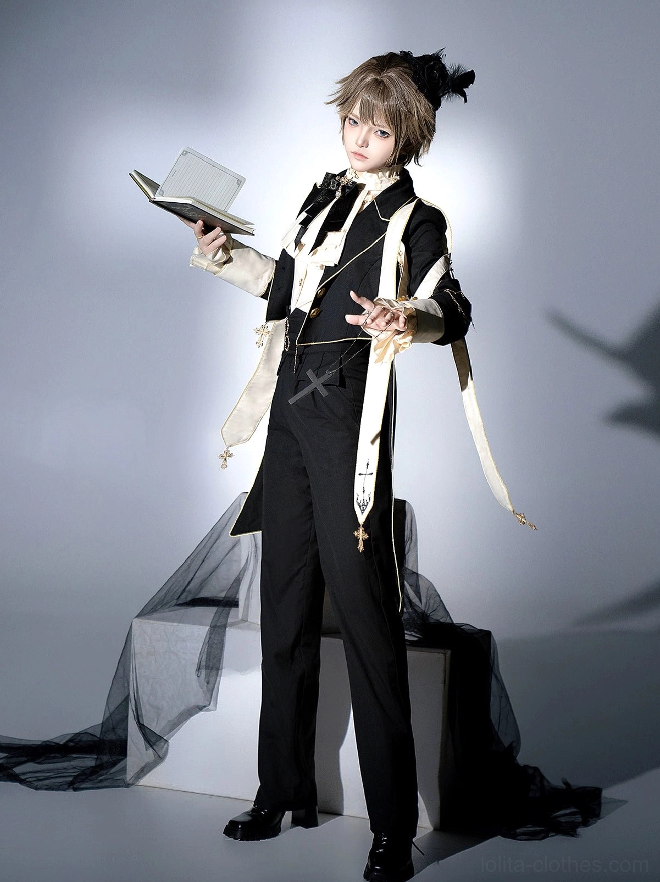 Ouji gothic lolita tailcoat suit black cream three-piece ensemble front standing view with cross metal accessories