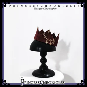 Vintage burgundy velvet Ouji Lolita crown with gold cross and star chain ornaments, front display view showing retro royal crown silhouette and gothic embellishments