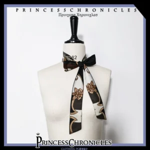 Black gothic retro floral printed Ouji Lolita hairband with golden vintage botanical patterns displayed flat on dress form showing front view of elegant headpiece