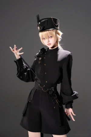 Ouji Lolita military shirt and high-low shorts set front three-quarter view with blonde model wearing military top hat and lantern sleeve blouse with tailored shorts