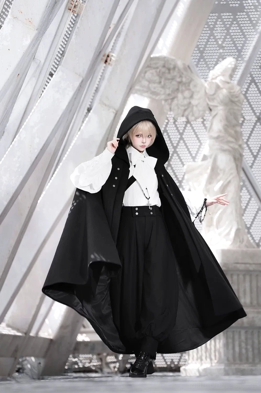 Ouji lolita full outfit straight front-body view blonde model outdoor angel statue architectural background puff sleeve blouse
