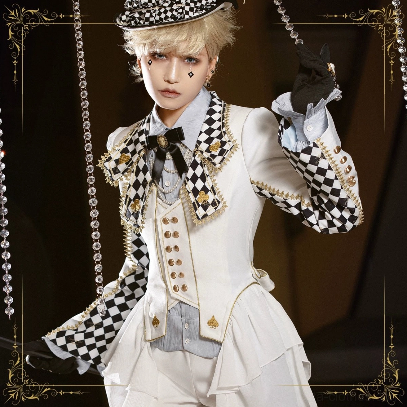 Full ouji Lolita prince aristocrat outfit ensemble blonde model checkerboard sleeve collar trim gold braid decorations black bow tie theatrical styling formal wear
