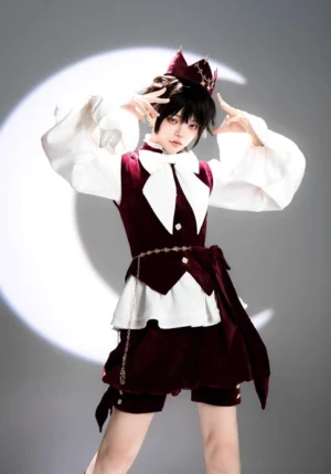 Model wearing complete Hare Hunter Ouji Lolita prince suit with matching burgundy velvet crown, two-tone red and white formal outfit with ruffled blouse and waist chain