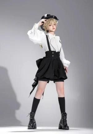 Retro Ouji Lolita two-piece set front view showing white ruffled bishop sleeve shirt with classic Peter Pan collar and black bloomer shorts with metal suspenders on blonde model in grey studio
