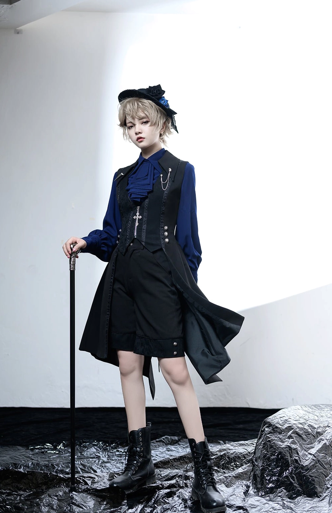 standing full body shot model short version black and blue gothic Ouji lolita coordinate asymmetrical shorts vest button details