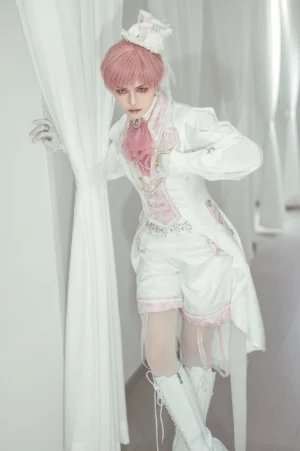 Pink-white Ouji Lolita sleeveless tailcoat front view worn by male model with ruffled collar and matching shorts