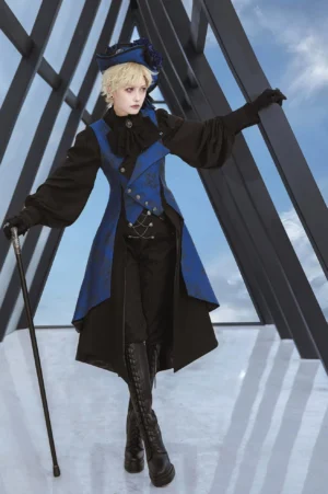Royal blue and black patterned Ouji Lolita sleeveless vest coat full-body front view with embroidered sword and star detail, worn outdoors with gothic aristocratic styling