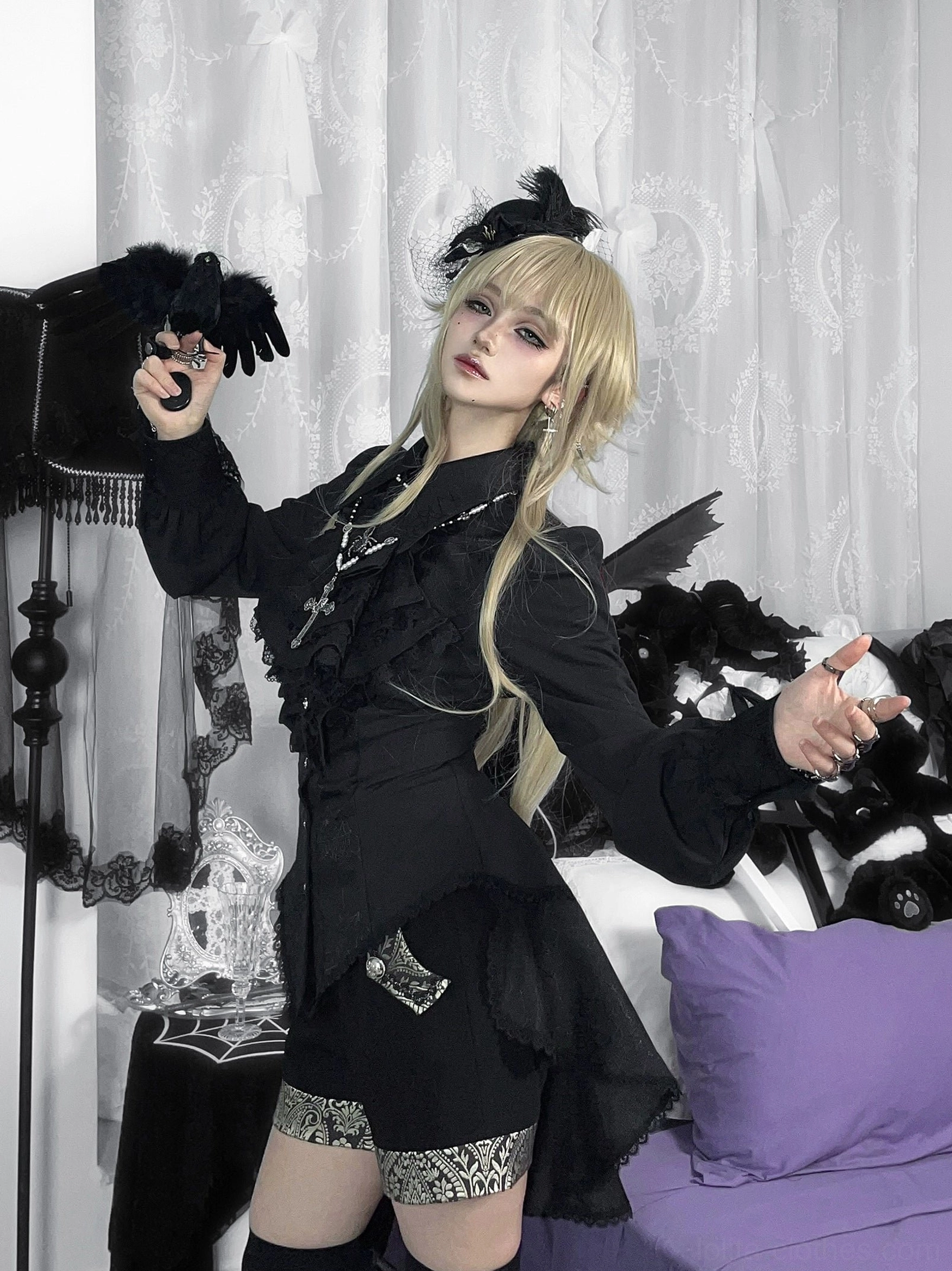 Gothic Ouji lolita spiderweb shirt styled in casual elegant coordinate with suspenders lolita pants and alternative accessories