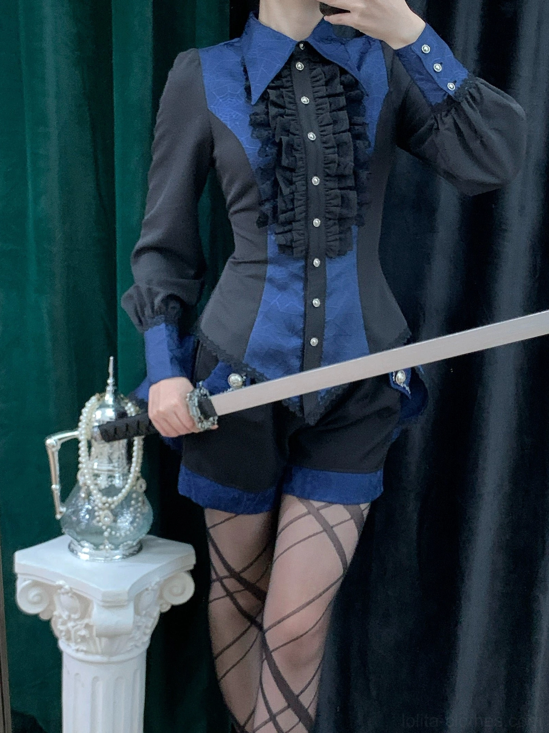 Gothic Ouji lolita spiderweb shirt showing construction detail of scalloped lace trim edges and finishing quality craftsmanship