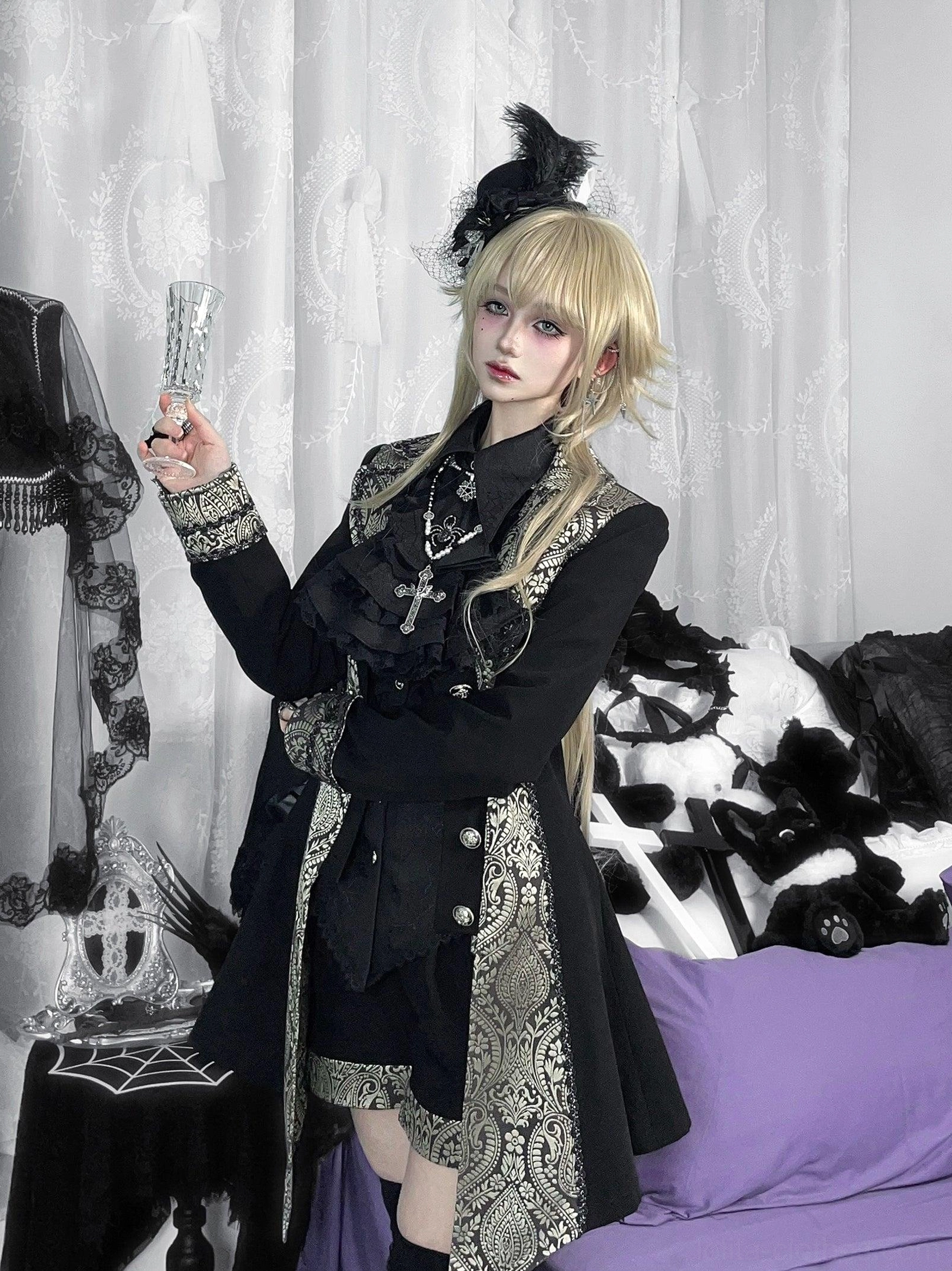 White gothic Ouji lolita spiderweb shirt sizing guide showing measurement points on dress form shoulder bust waist sleeve