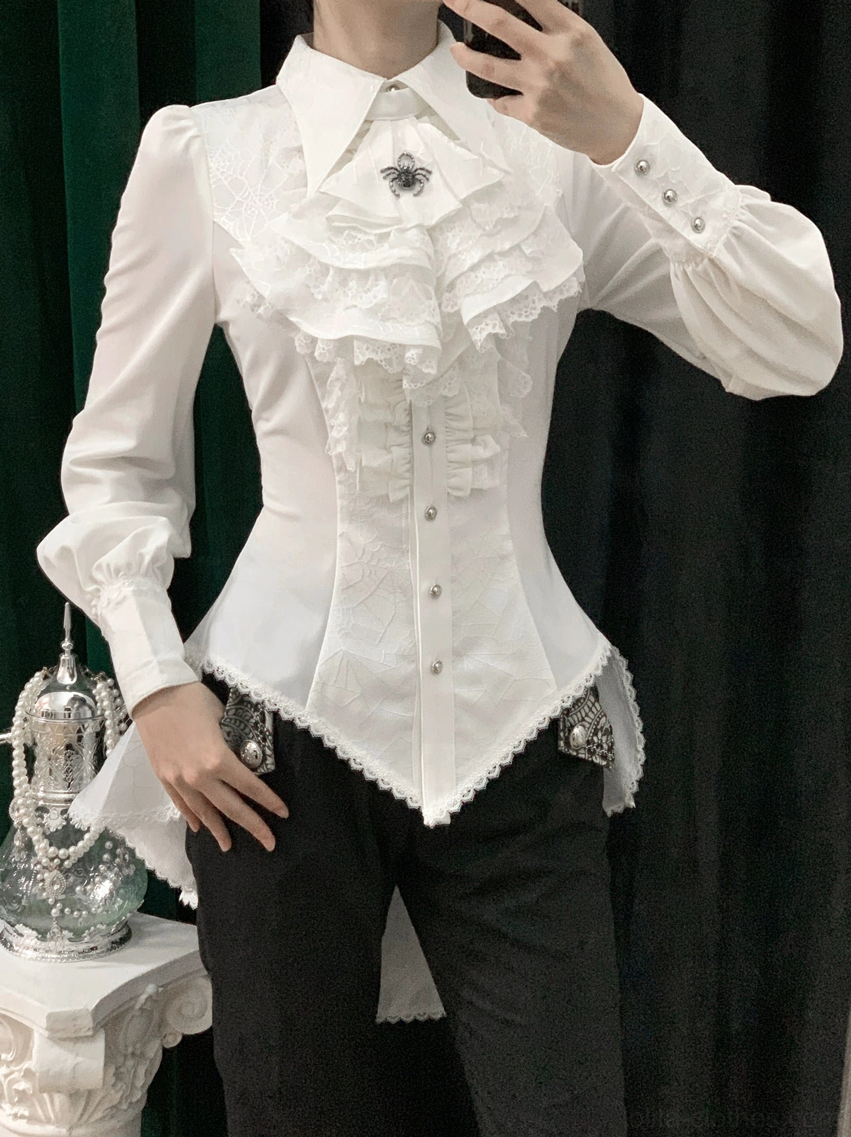 Gothic Ouji lolita spiderweb shirt storage and care recommendation showing proper hanging folding method for long-term maintenance