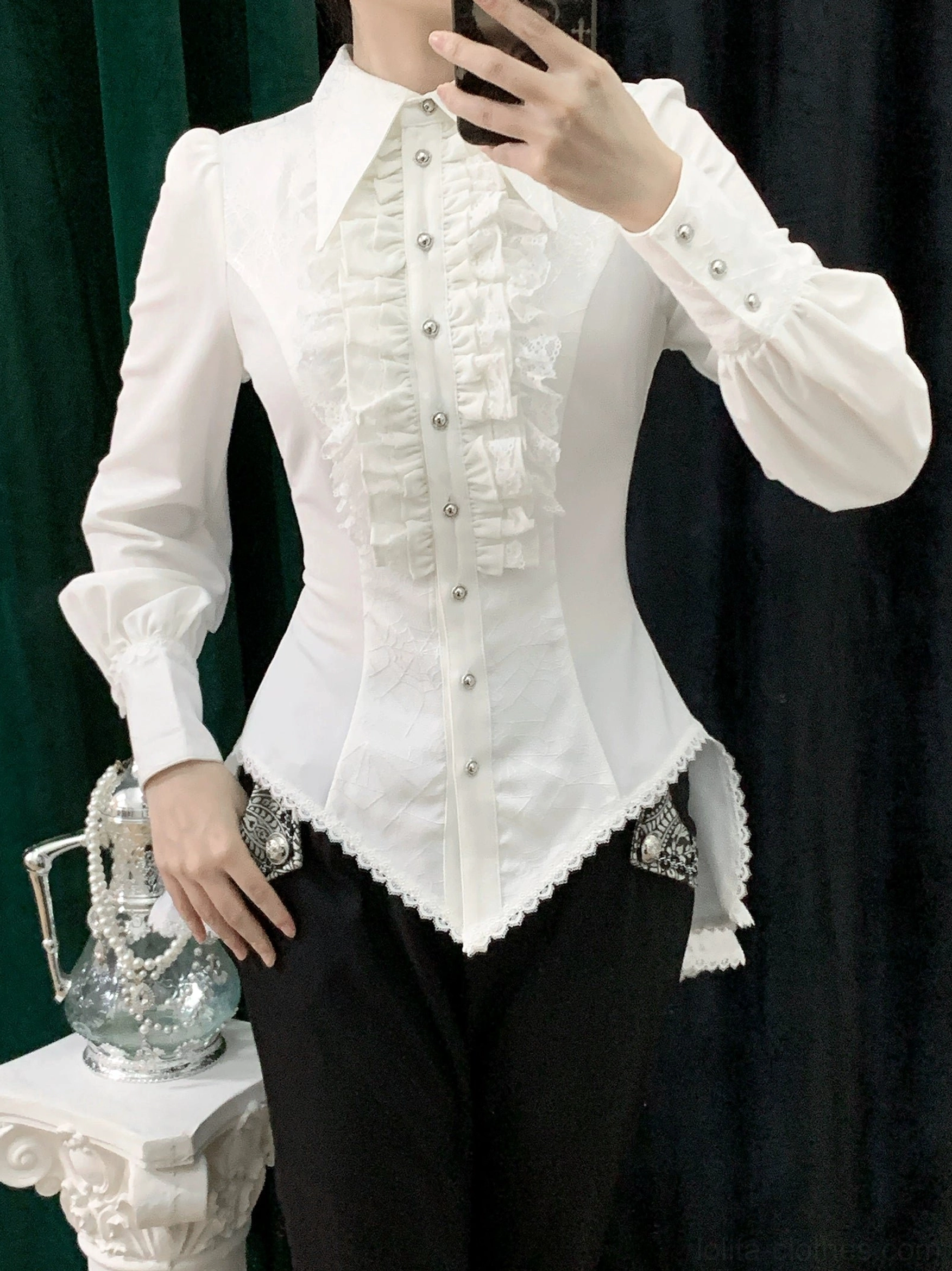 White gothic Ouji lolita shirt with spiderweb pattern worn by live model front view showing ruffled front placket bishop sleeves and fitted waist