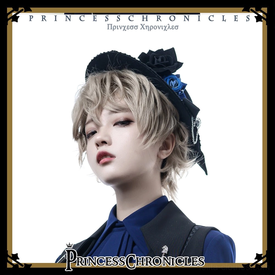 model wearing black and blue gothic Ouji top hat close-up portrait blonde female lolita fashion ouji style headpiece matching coordinate