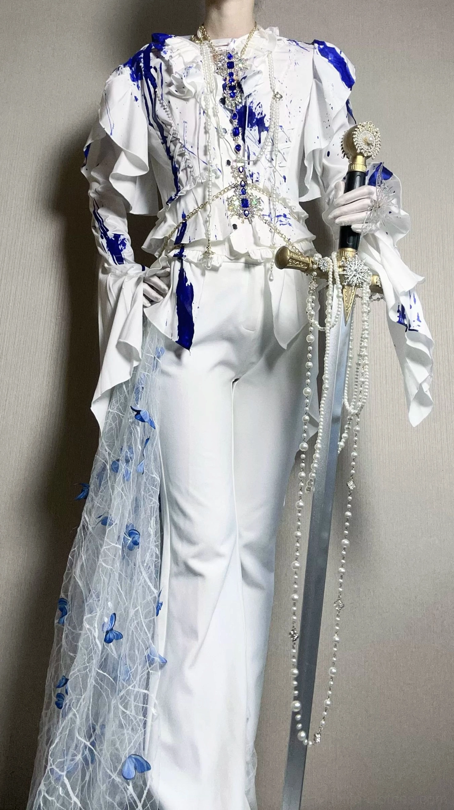 Satin Ouji lolita trailing blouse product detail showing matte white satin fabric texture, dual-tier ruffled collar construction, and decorative sleeve panel design elements close-up