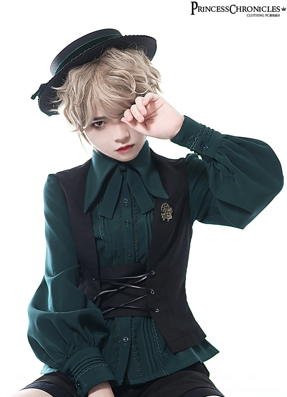 Close-up upper body view of Ouji Lolita black waistcoat with slim-fit corset silhouette and metal brand emblem detail