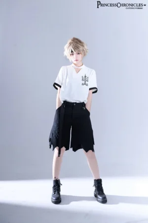 Full-body front view of androgynous model wearing white embroidered ouji lolita short-sleeve shirt with black cuffs and choker neckline, paired with black jagged hem cargo shorts and combat boots on grey studio background