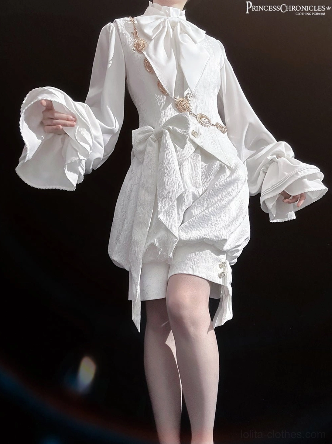 White ouji lolita formal vest right side angle featuring scalloped edge cuffs and vintage metal chain waist accent