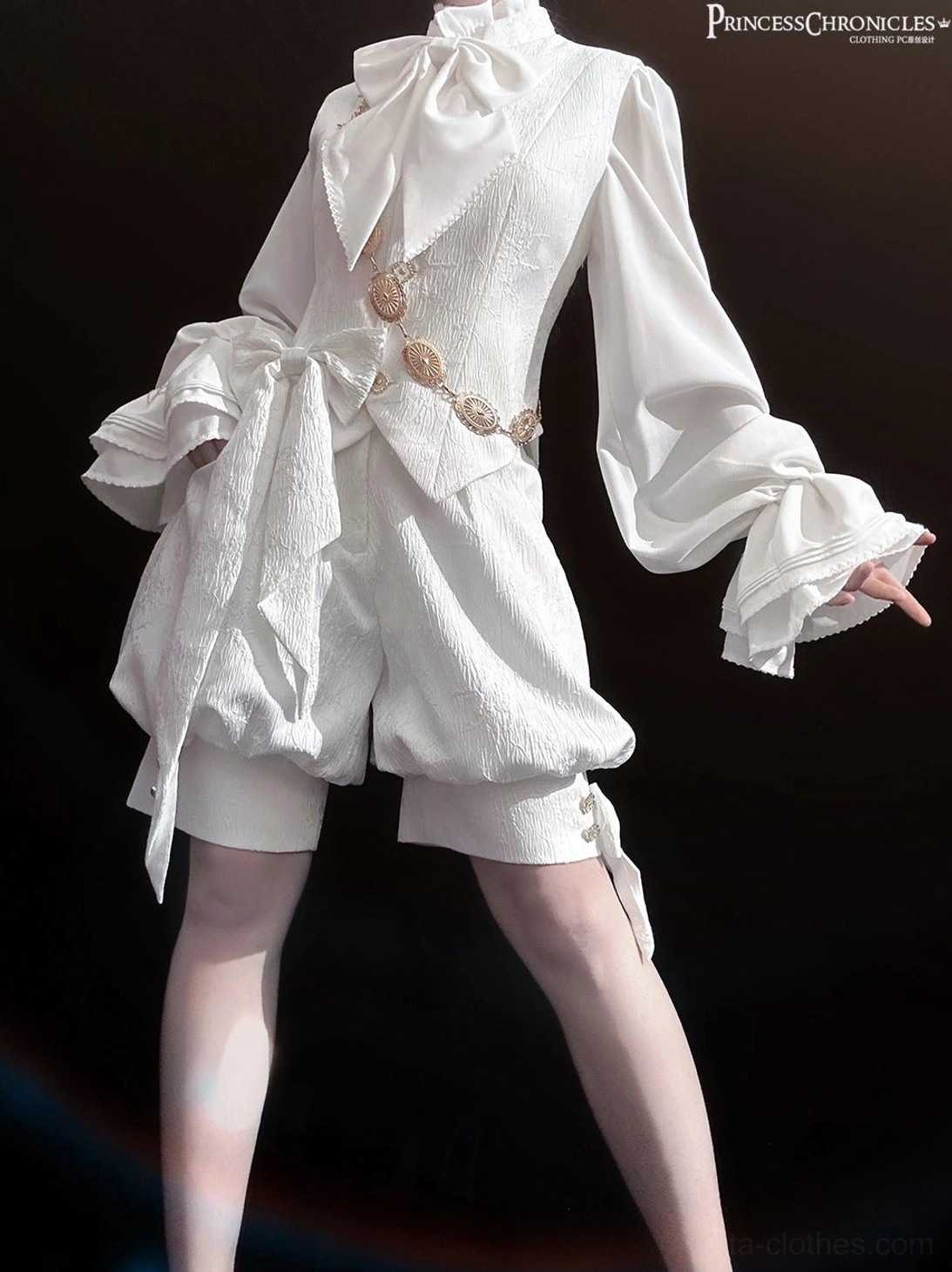 White ouji lolita vintage jacquard vest relaxed standing pose showing gold vest buttons and bishop sleeve construction