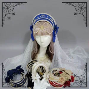 Vintage palace lolita flower headdress with detachable white dotted veil and pearl trimmed gold embroidery on blue and white color scheme, worn on mannequin with light pink wig