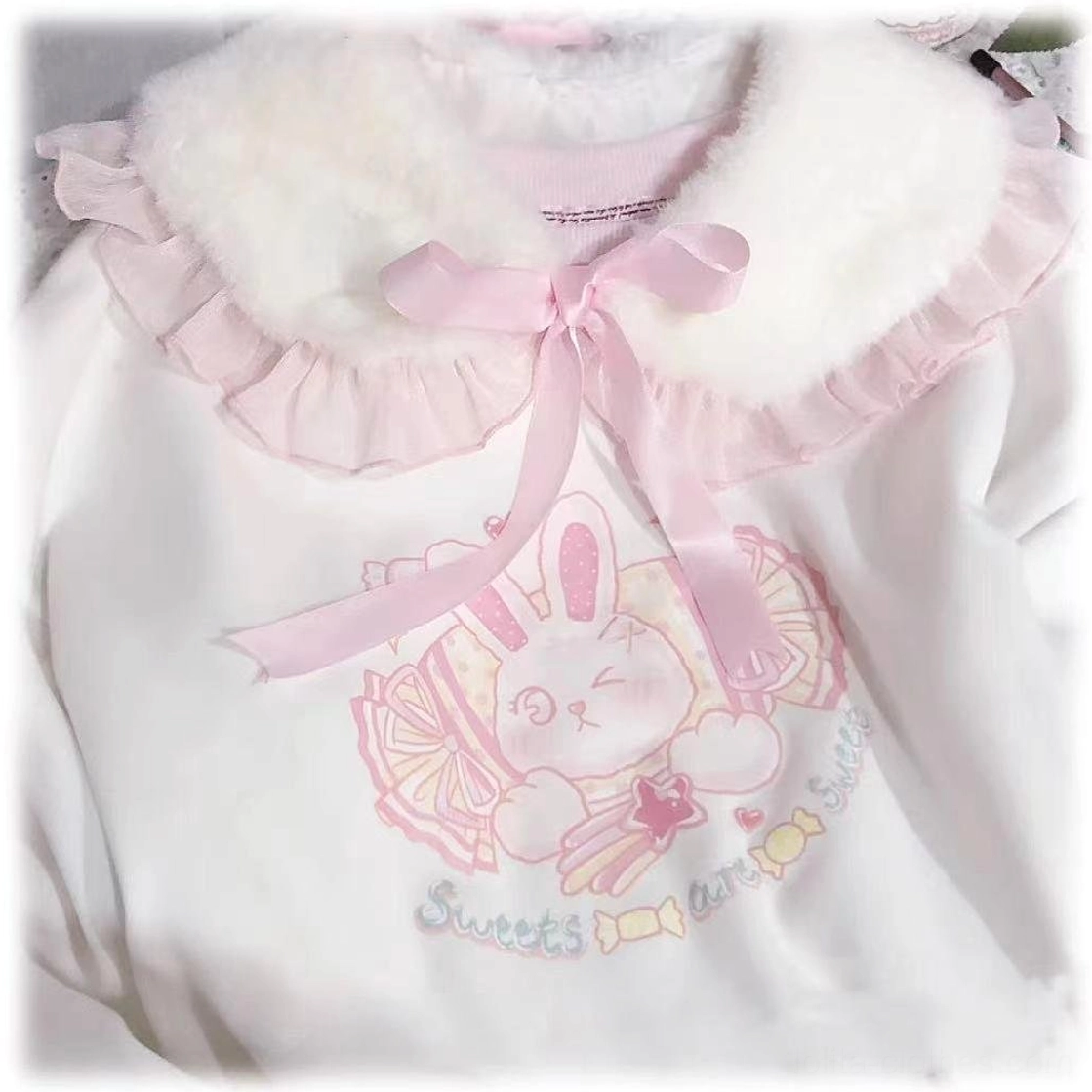 Pale pink lotus leaf edge Lolita plush false collar with pink bow worn over a white bunny print sweatshirt