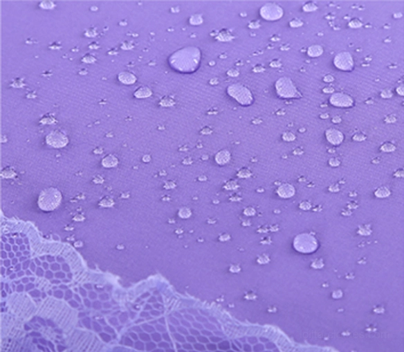 Parasol in rainy outdoor setting demonstrating functional use and weather protection capability in real conditions
