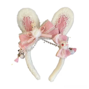 Pastel pink lolita rabbit ear headband with white fuzzy bunny ears, delicate lace trim, satin bows, pearl chain tassels and plush rabbit ornament details for han lolita coordinates