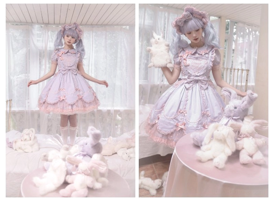 Pastel vintage Lolita dress set featuring fitted lace bodice and large architectural waist bow surrounded by plush toys