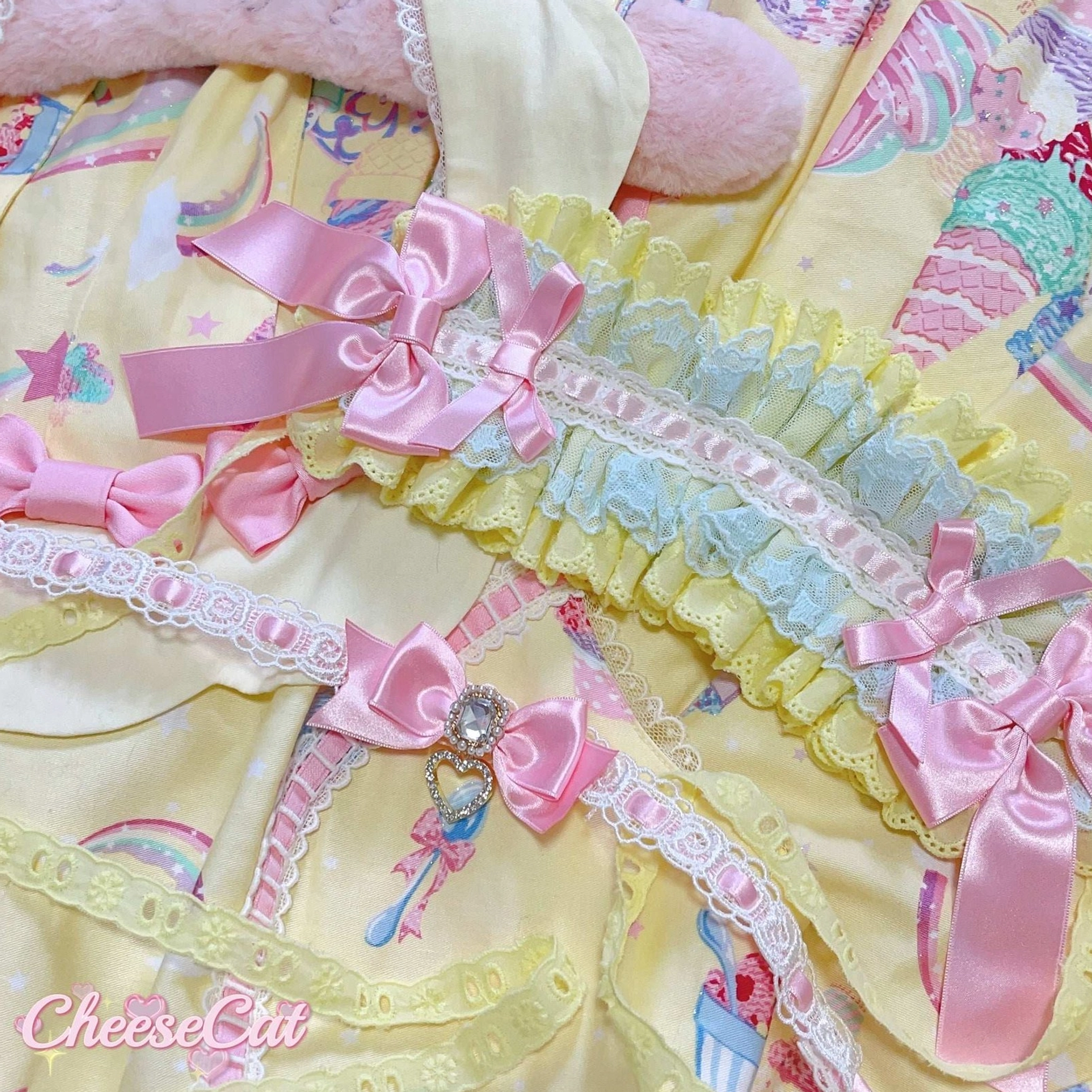 Pastel sweet Lolita headband with ruffled lace trim and satin bow details captured in studio lighting highlighting fabric quality