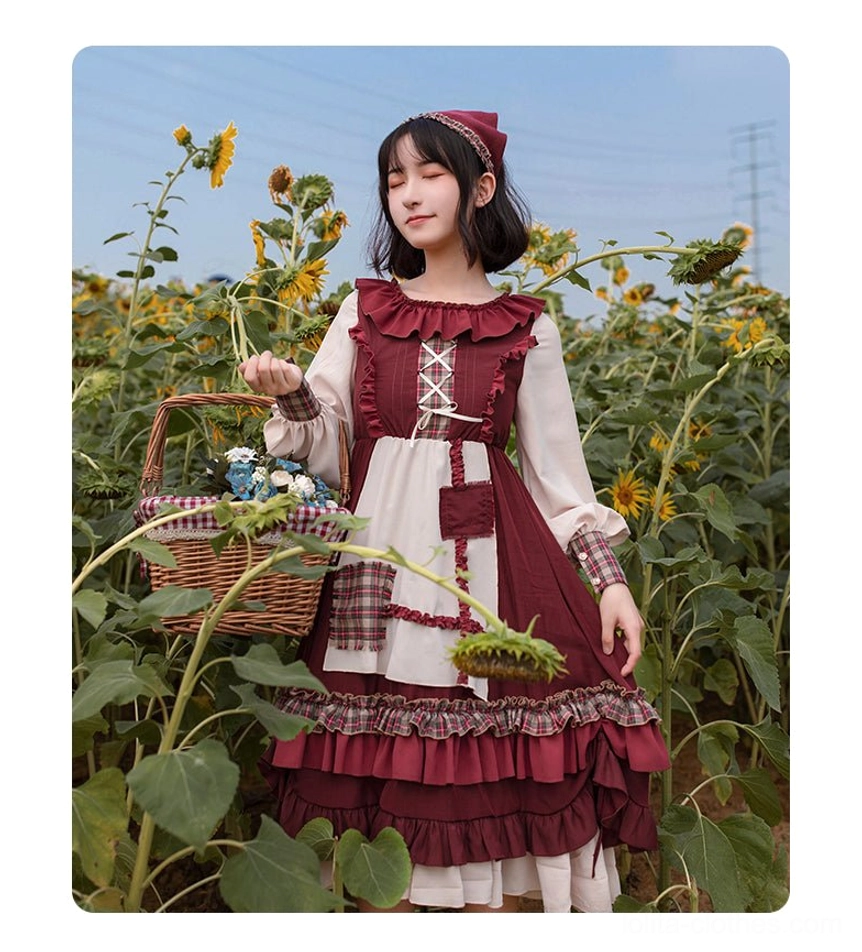 Pastoral Lolita OP dress front bodice close-up showing mutton sleeves, lace-up crossover bust detail, plaid fabric patches, and tiered ruffled skirt construction in wine red and cream tones
