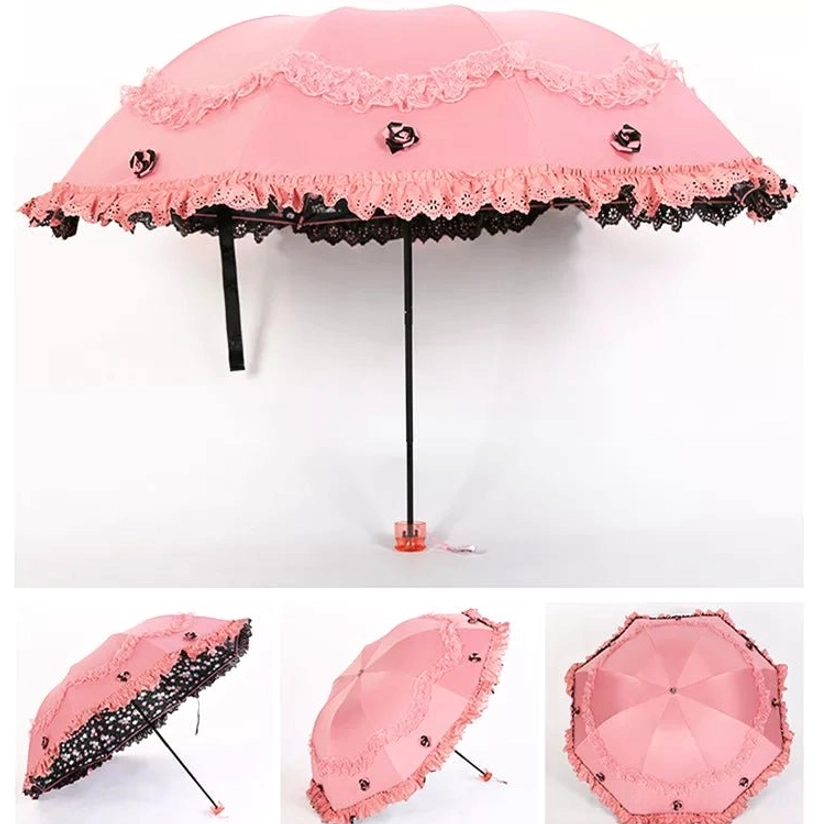 Peach pink foldable lolita parasol with dimensional floral embroidery and scalloped lace trim, metal handle with hanging strap, fully opened display