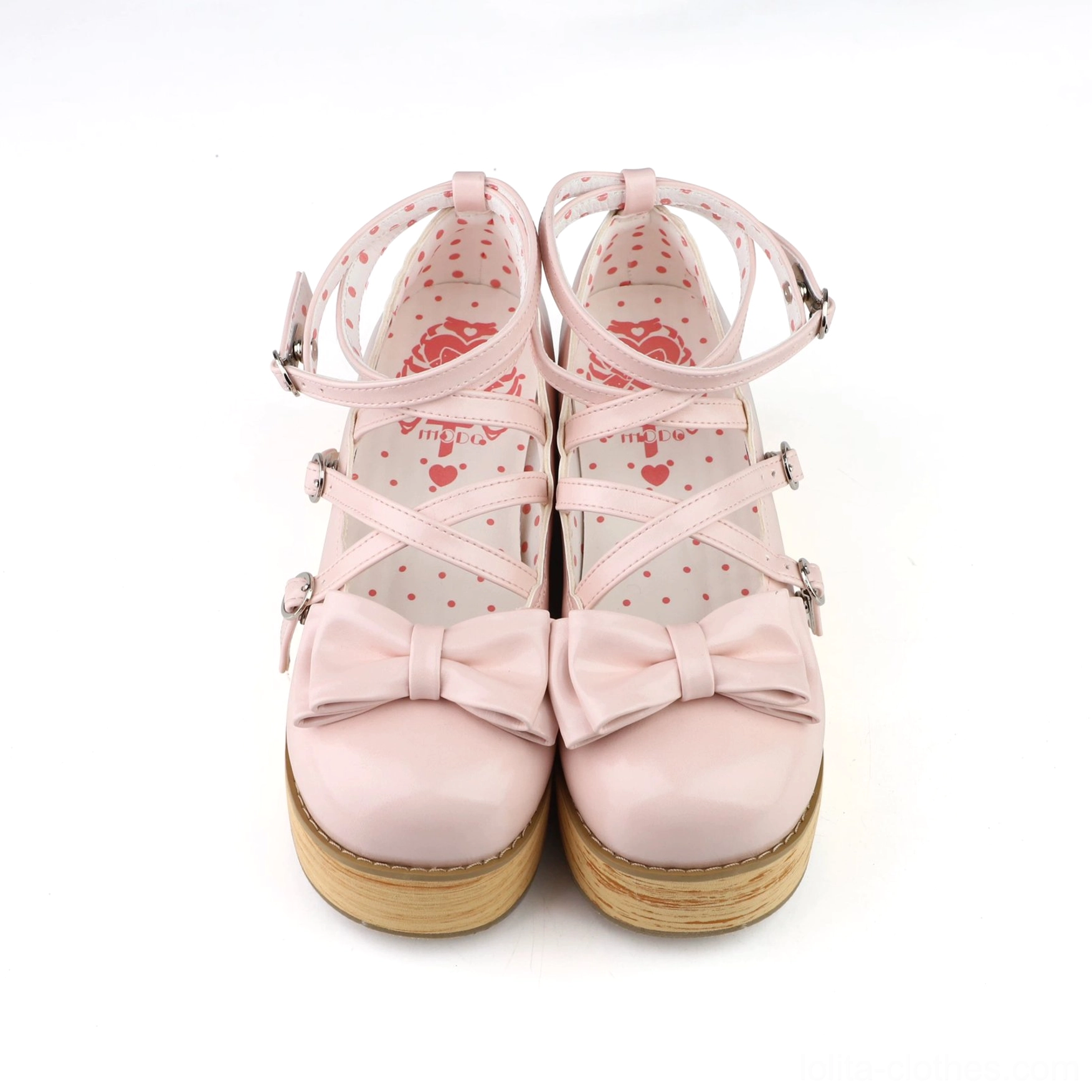 Peach pink lolita platform shoes isolated studio shot smooth pu leather round toe bow cross strap design thick wooden platform sole product detail photography