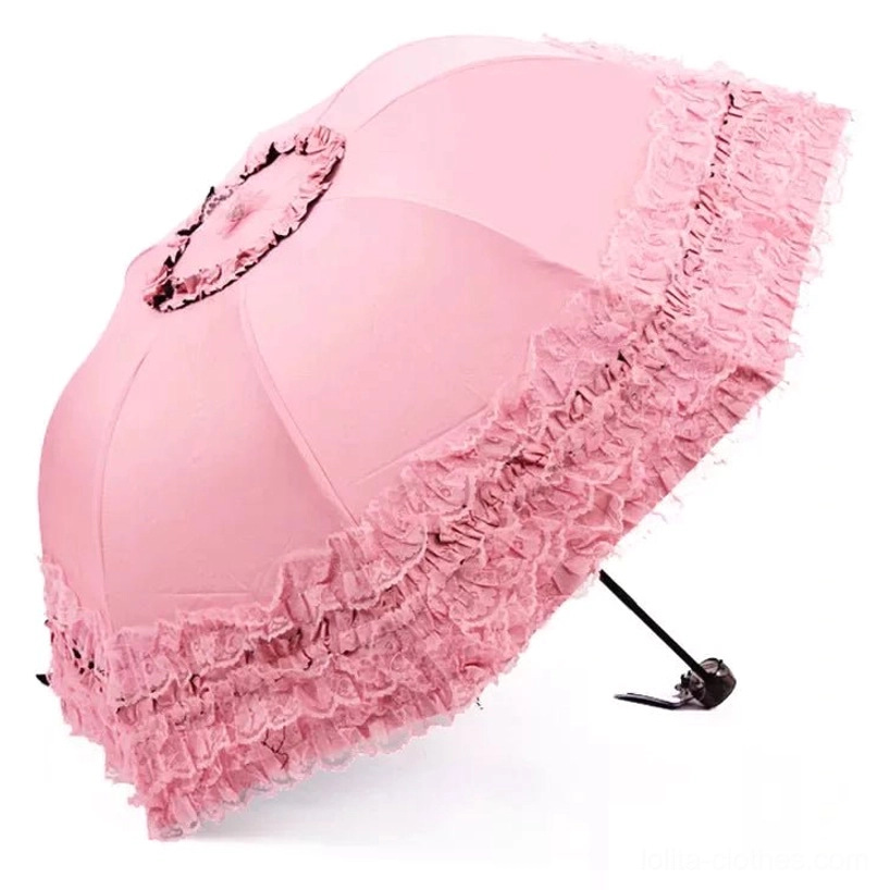 Peach pink version C foldable lolita parasol with elegant ruffled lace construction and refined metal accents, compact portable design