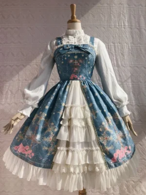 Peacock Blue Teal Lolita JSK Jumper Skirt with starry cross print, pink rose details, front chest bow decoration, tiered layered skirt, front three-quarter mannequin display