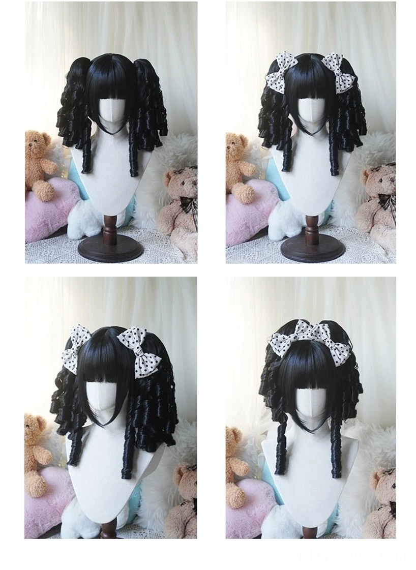 Pure black Lolita detachable ponytail bob wig with black polka-dot twin bows and spiral ringlet ponytails shown on mannequin with plush background