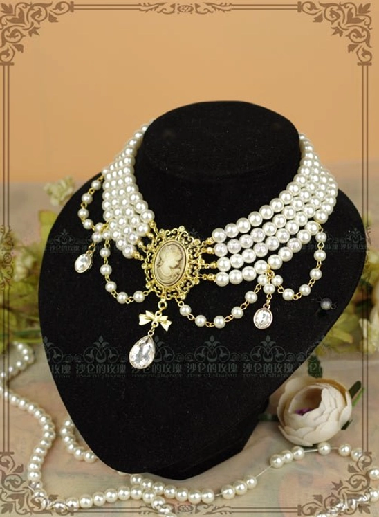Detailed close-up photography of pearl choker necklace tiered strands, showing luminous pearl quality, metal cameo pendant craftsmanship, and crystal accent dangling details for Lolita fashion jewelry appreciation