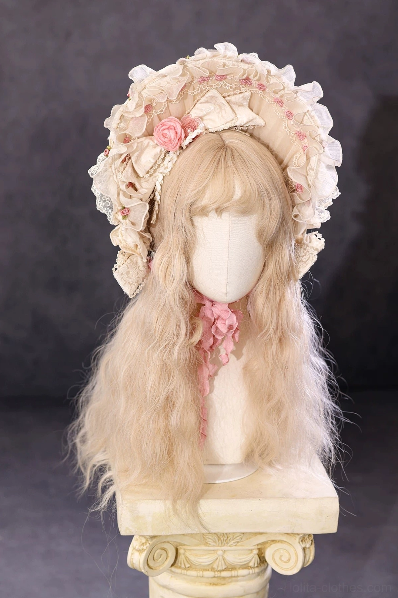 Pearl Sheen vintage Lolita BNT bonnet with layered ruffled lace and pink fabric rose accent on wooden mannequin head