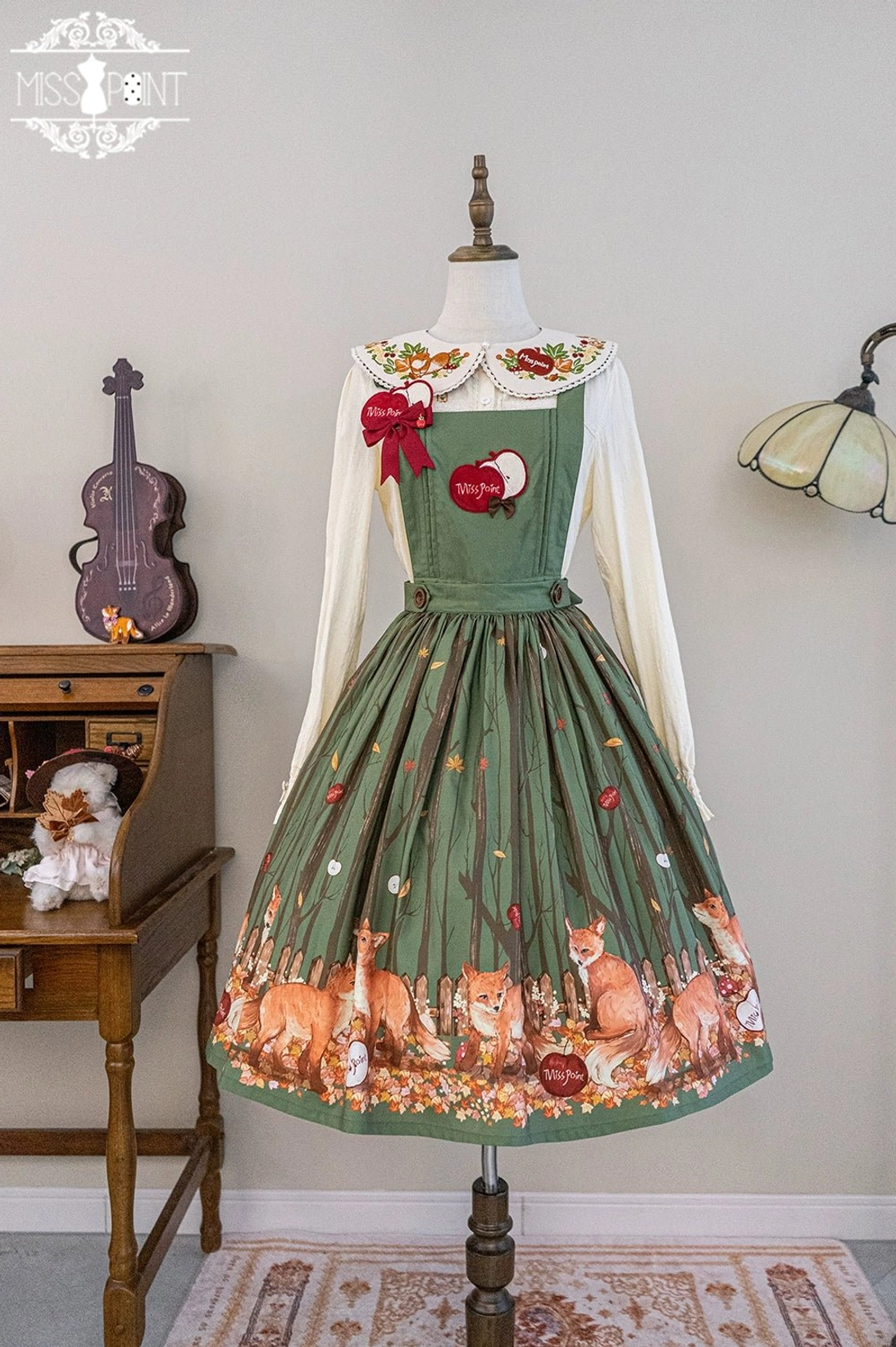 Persimmon red lolita scarf and collar coordinated flat lay showing fox pattern embroidery woodland aesthetic matching accessory set